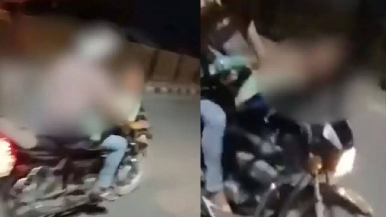 फिरोजाबाद में बाइक पर कपल का रोमांस, सोशल मीडिया पर मचा बवाल