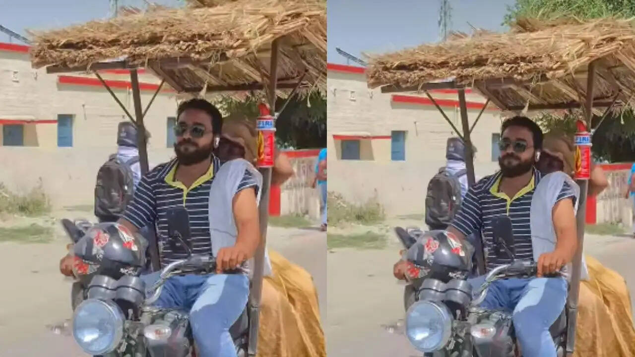 गर्मी से बचने का अनोखा जुगाड़: बाइक को बनाया चलता-फिरता घर