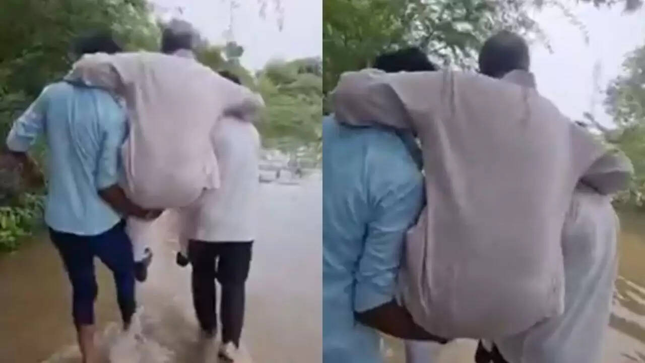 राजस्थान विधायक का अनोखा तरीका: बाढ़ में गांववालों के कंधों पर बैठकर किया दौरा