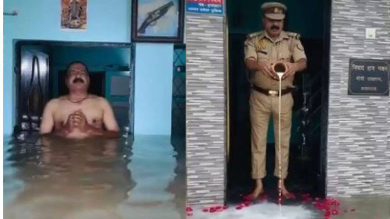 प्रयागराज में पुलिसकर्मी ने बाढ़ के पानी की पूजा की, वीडियो हुआ वायरल