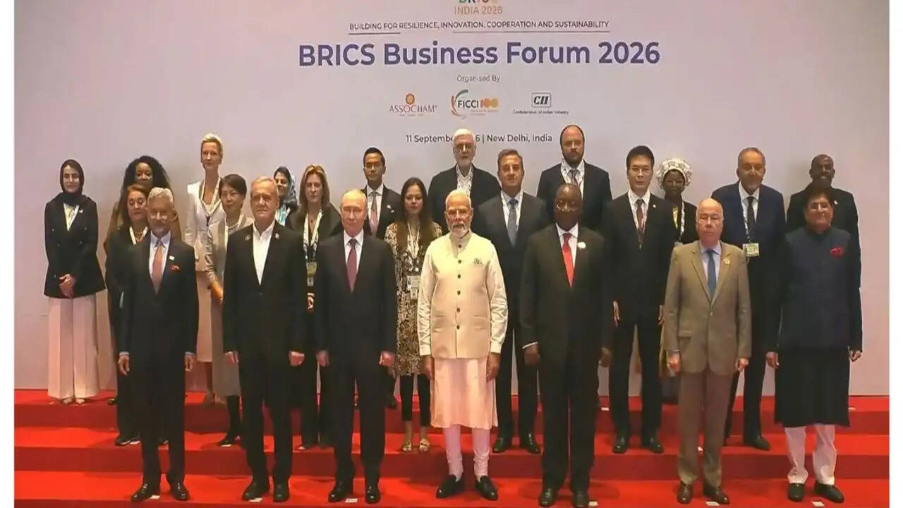 प्रधानमंत्री मोदी और BRICS नेताओं की सामूहिक तस्वीर, BRICS Business Forum 2026 में चर्चा