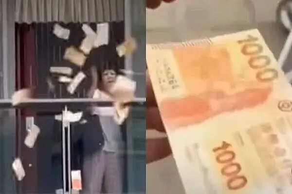 महिला ने हाईराइज इमारत से फेंके लाखों रुपये, इलाके में मची अफरा-तफरी