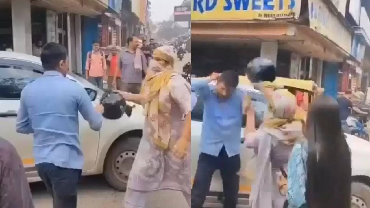 गाजियाबाद में कैब और स्कूटी की टक्कर: महिला ने ड्राइवर को हेलमेट से पीटा