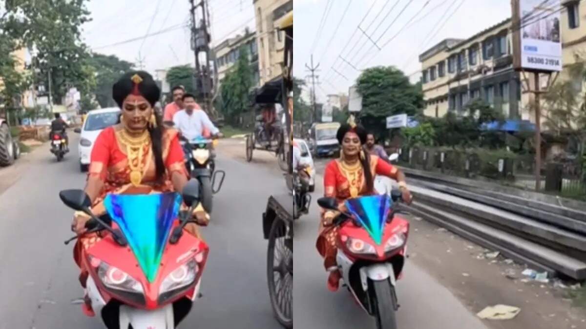 लाल साड़ी पहन दुल्हन ने सड़क पर दौड़ाई स्पोर्ट्स बाइक, देख फटी रह गई लोगों की नजरें